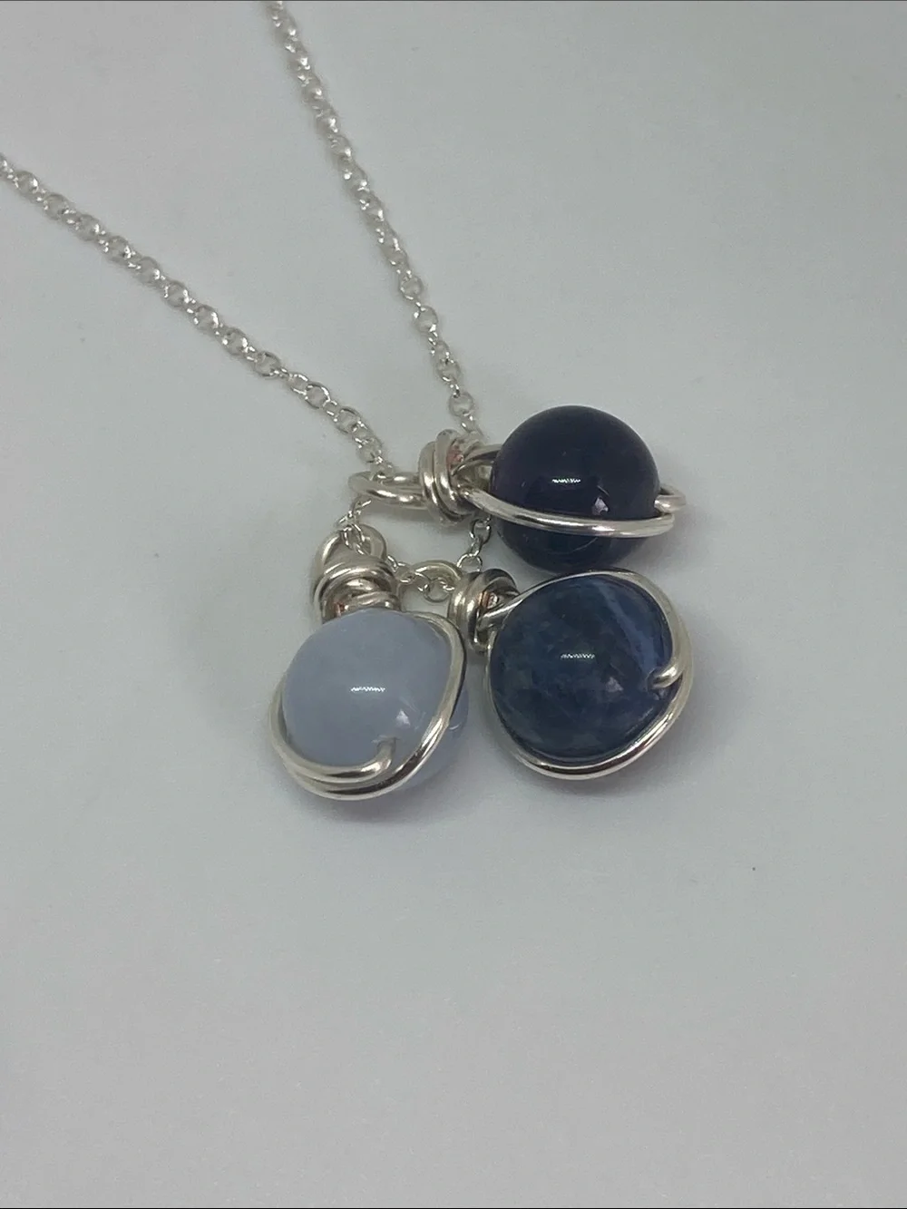 Silver necklace with amethyst, sodalite and aquamarine stone charms